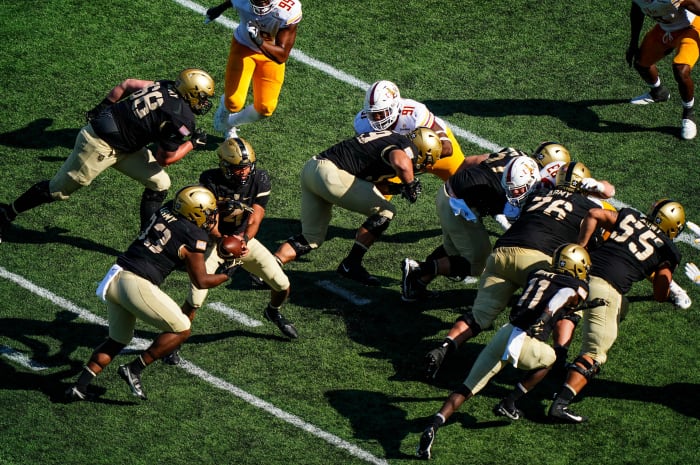 College football returned this fall—including this game between Army and Louisiana Monroe—amid a pandemic; experts predict that schools and the NCAA will face future litigation over not just head injuries, but also the coronavirus.